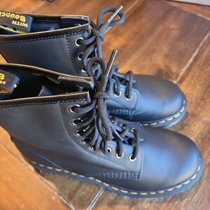 Dr. Martens Black Leather Boots with Yellow Accents